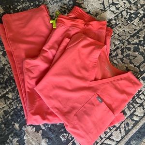 FIGS XXL/T Hot Coral Kade and XL Hot Coral Catarina Figs Limited Edition Color.